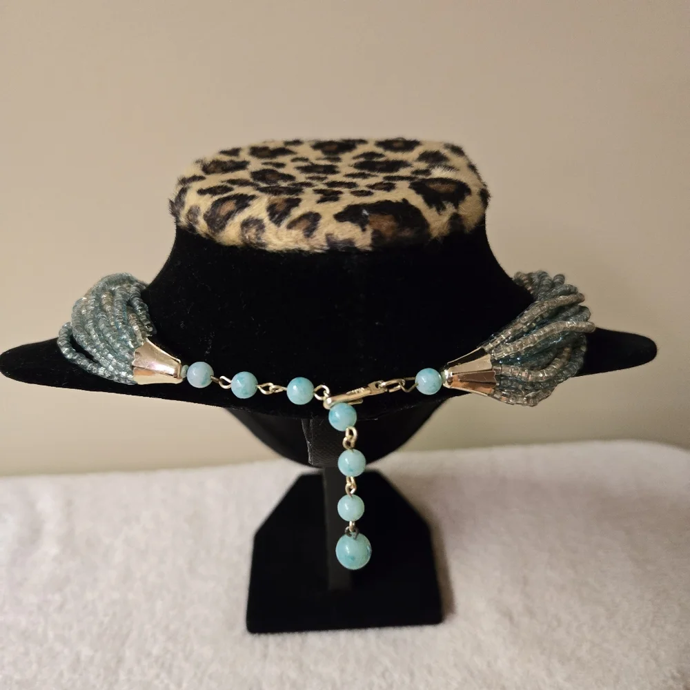 Vintage multiple strands of blue & silver seed bead necklace & clip on earrings